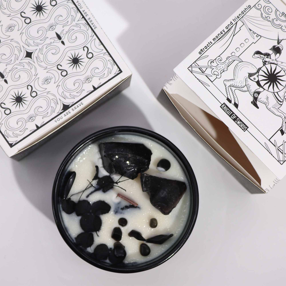 Crystal Flower Candle – The King of Swords · Cedarwood – styled view