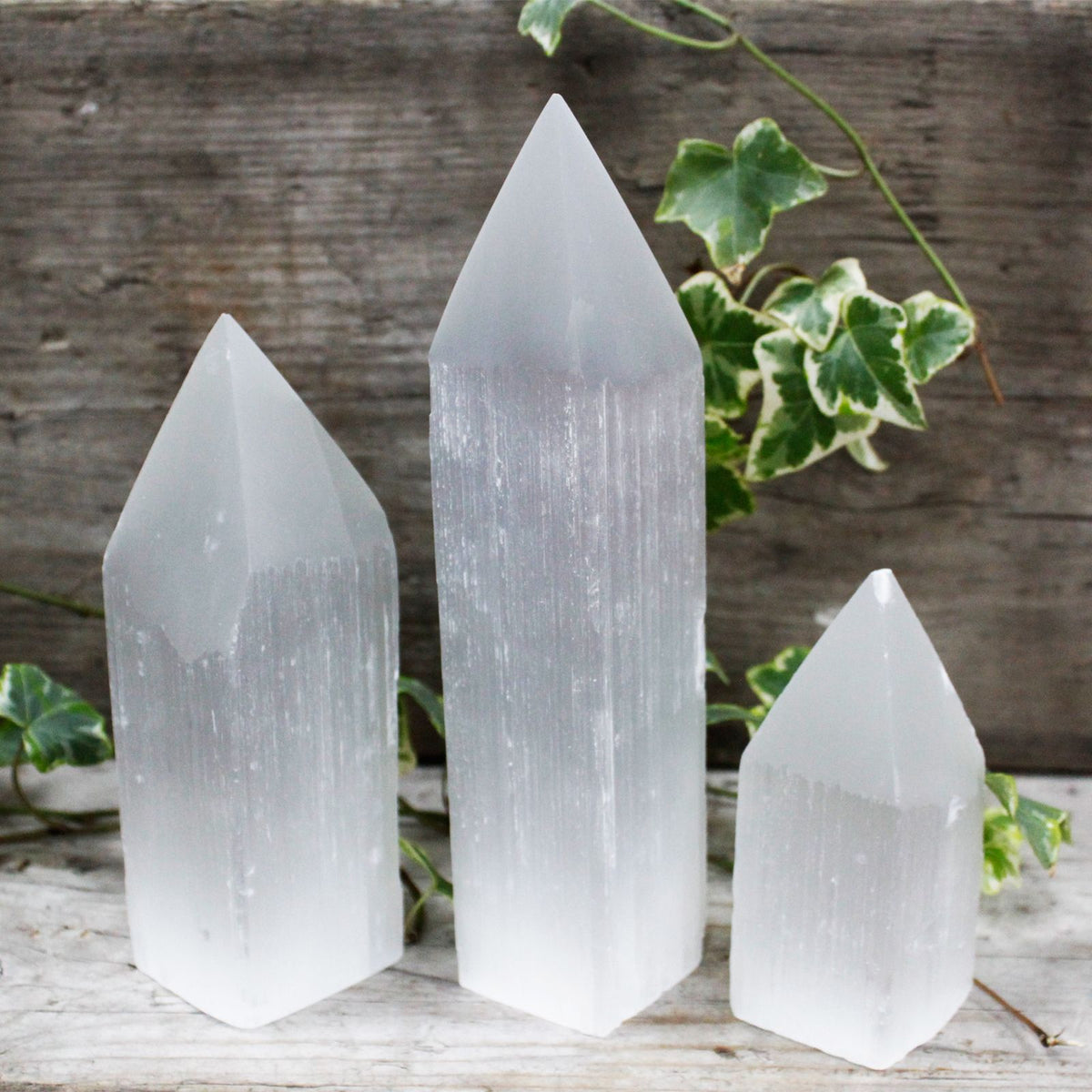 Selenite Tower – Pencil Point · 15 cm – styled view
